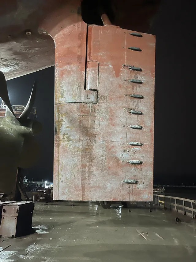 Rudder with zinc anodes, at night. Shanghai, early 2026.